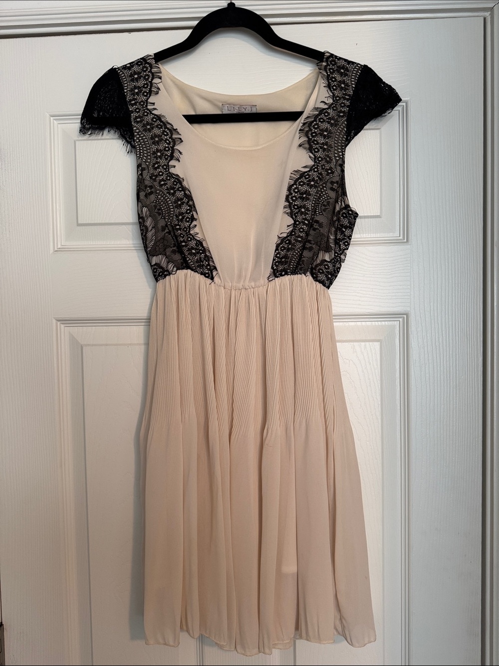 Cream with black lace babydoll dress from London Boutique